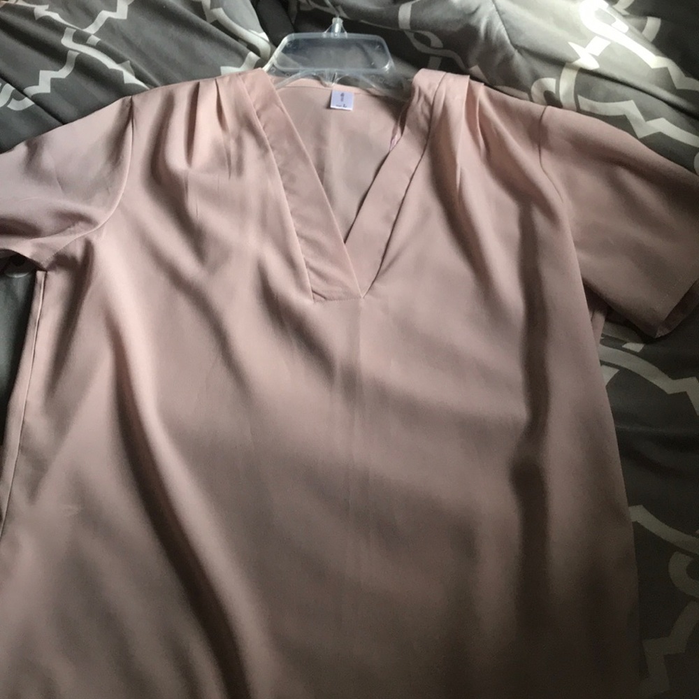 Blush color blouse flows